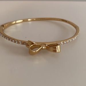 Kate Spade gold bow & clear stone bracelet